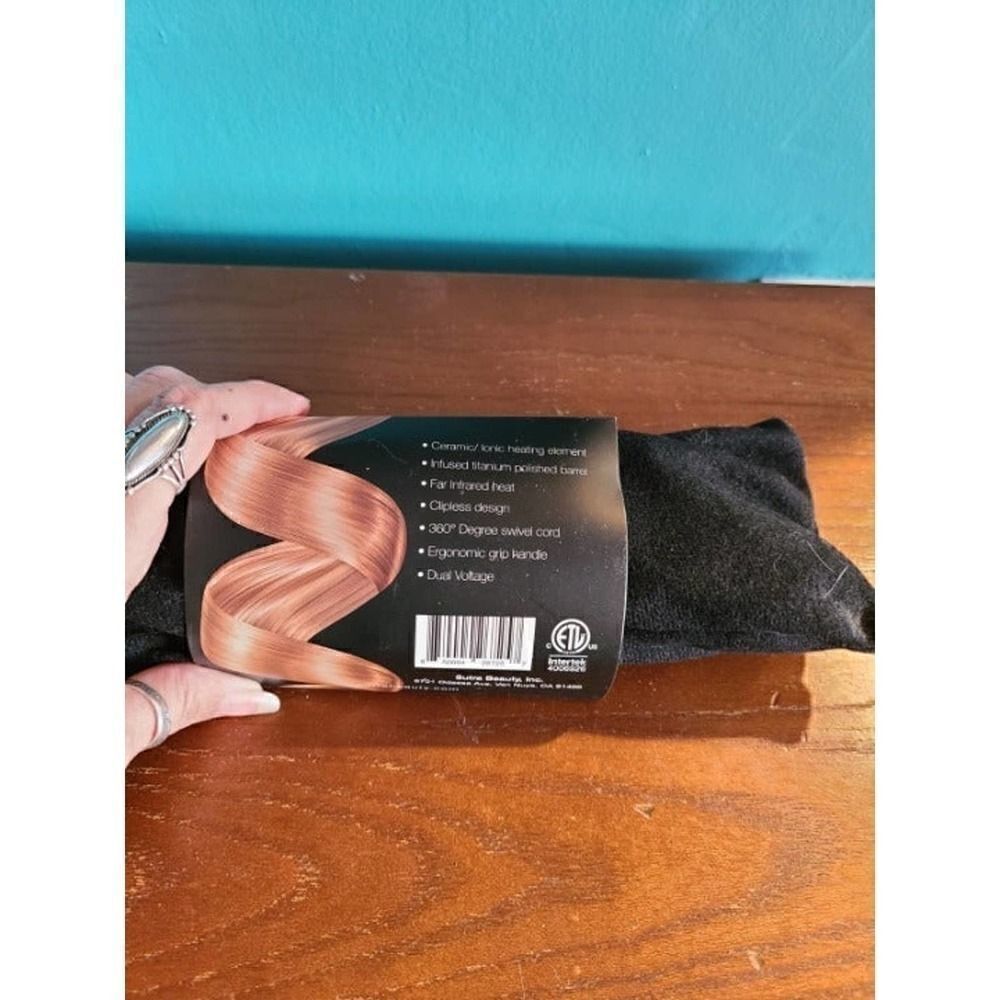 NWT Sutra Beauty Clipless Curling Iron